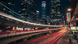 City at Night with Light Streaks and Skyscrapers